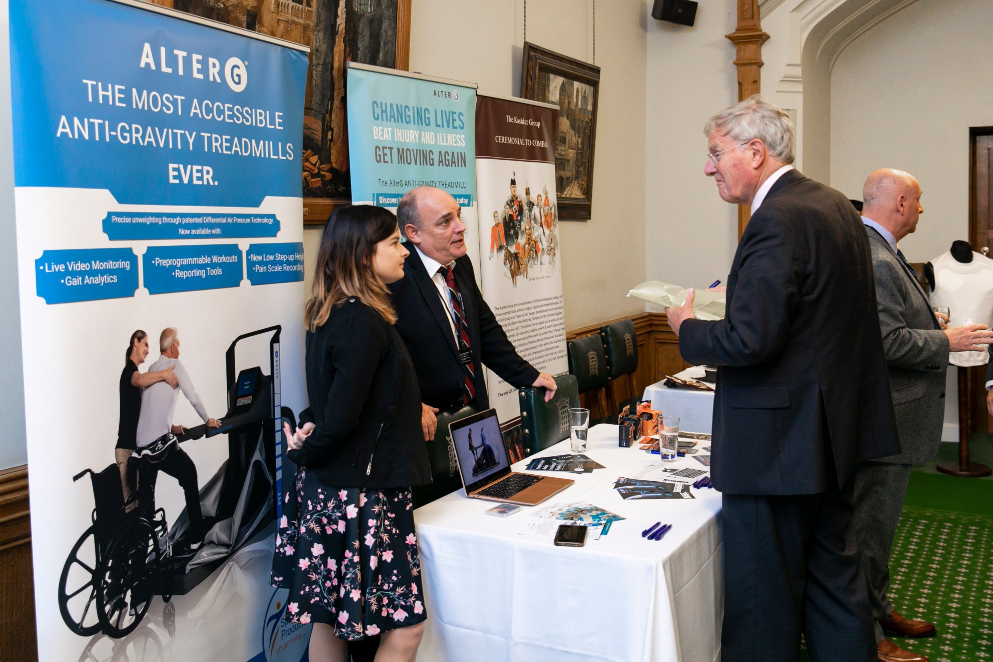 Representatives of SportsMed Products Limited speaking with Sir Christopher Chope MP | Credit: Visual Eye